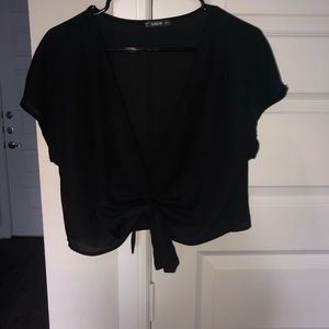 Black v-neck top with tie